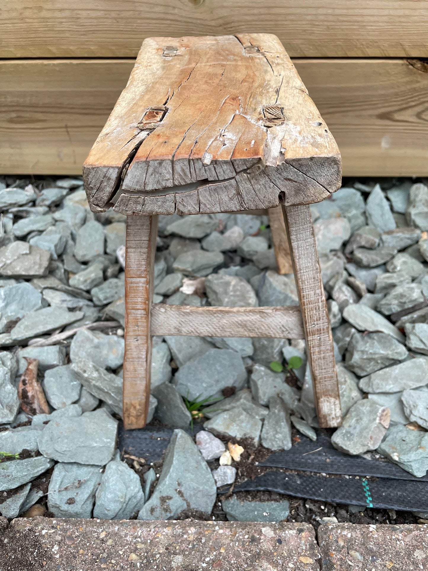 Mini wooden rustic bench stool pot stand side table.