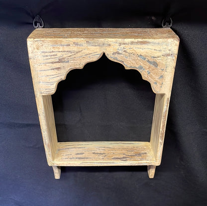 Single Indian wooden temple arch shelf light brown scraped finish.
