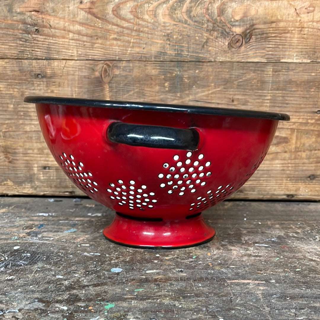 Enamelled metal red and white cullender.