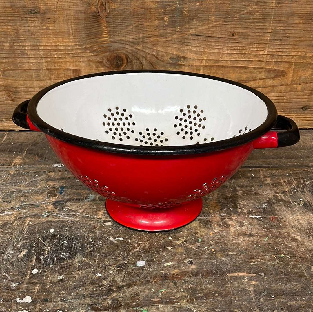 Enamelled metal red and white cullender.