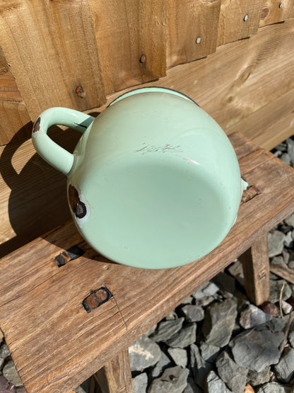 Pale green enamel tea pot decorative kitchenalia.