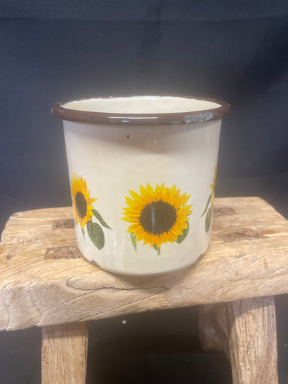 Large cream enamel mug with sunflowers decor.