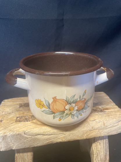 Enamel small two handled cooking pot cream and brown with floral design.