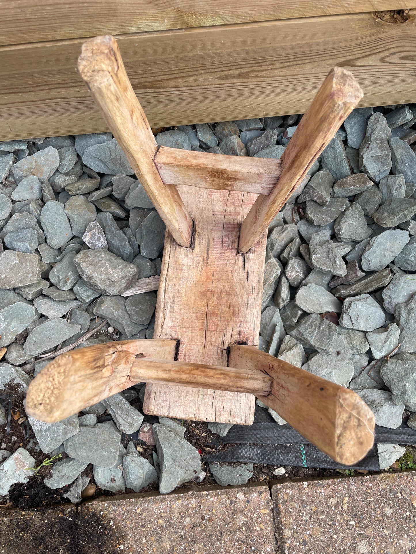 Mini rustic wooden bench stool pot stand table.