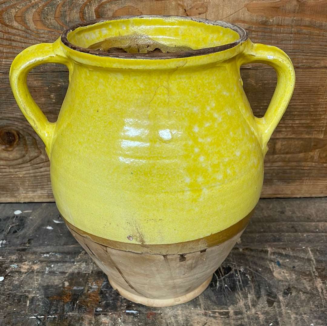 Hungarian hand thrown terracotta part glazed urn pot with two handles.