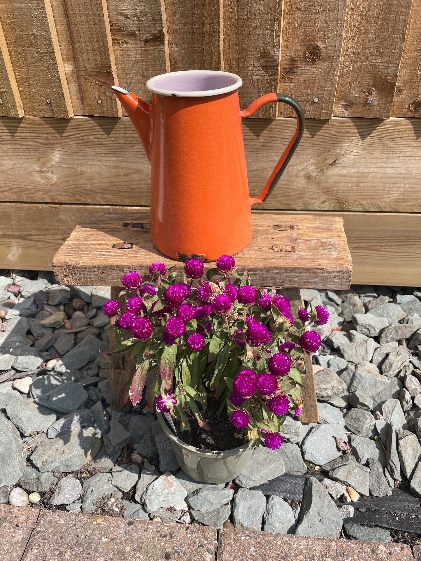 Enamel jug orange 1L.