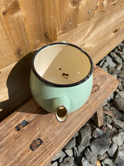 Pale green enamel tea pot decorative kitchenalia.