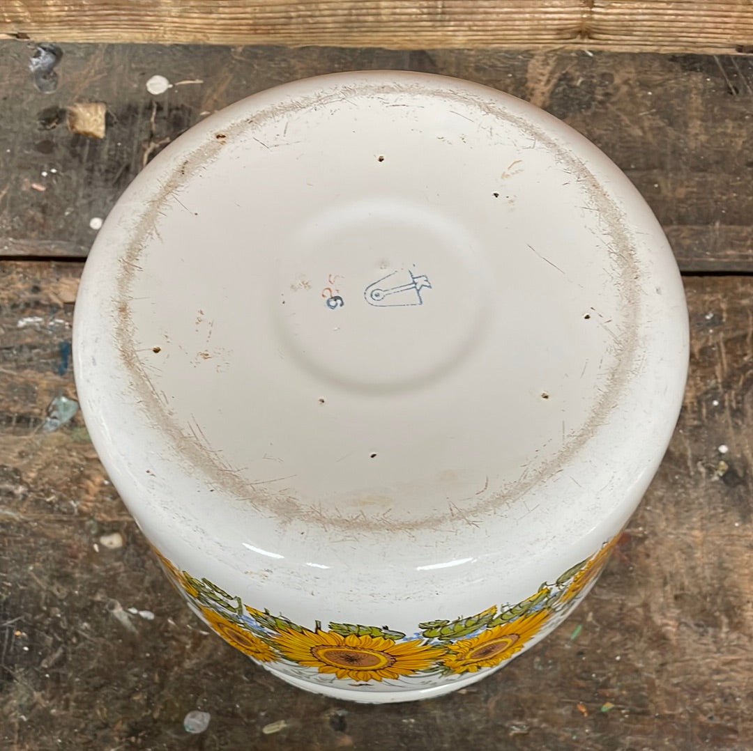 White enamel pot with handle and lid, sunflower décor.