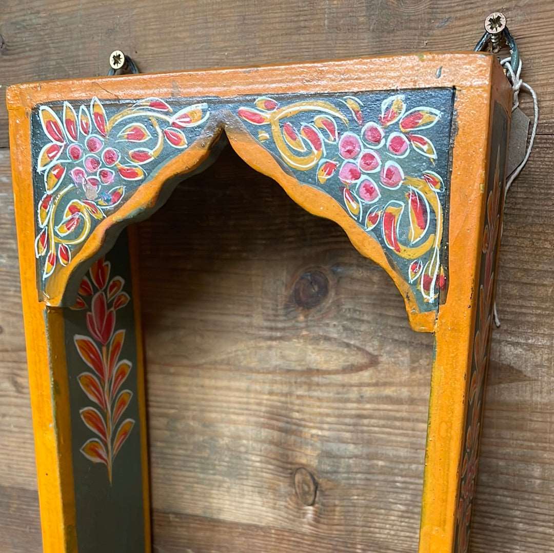 Indian decorative painted single arch temple shelf.