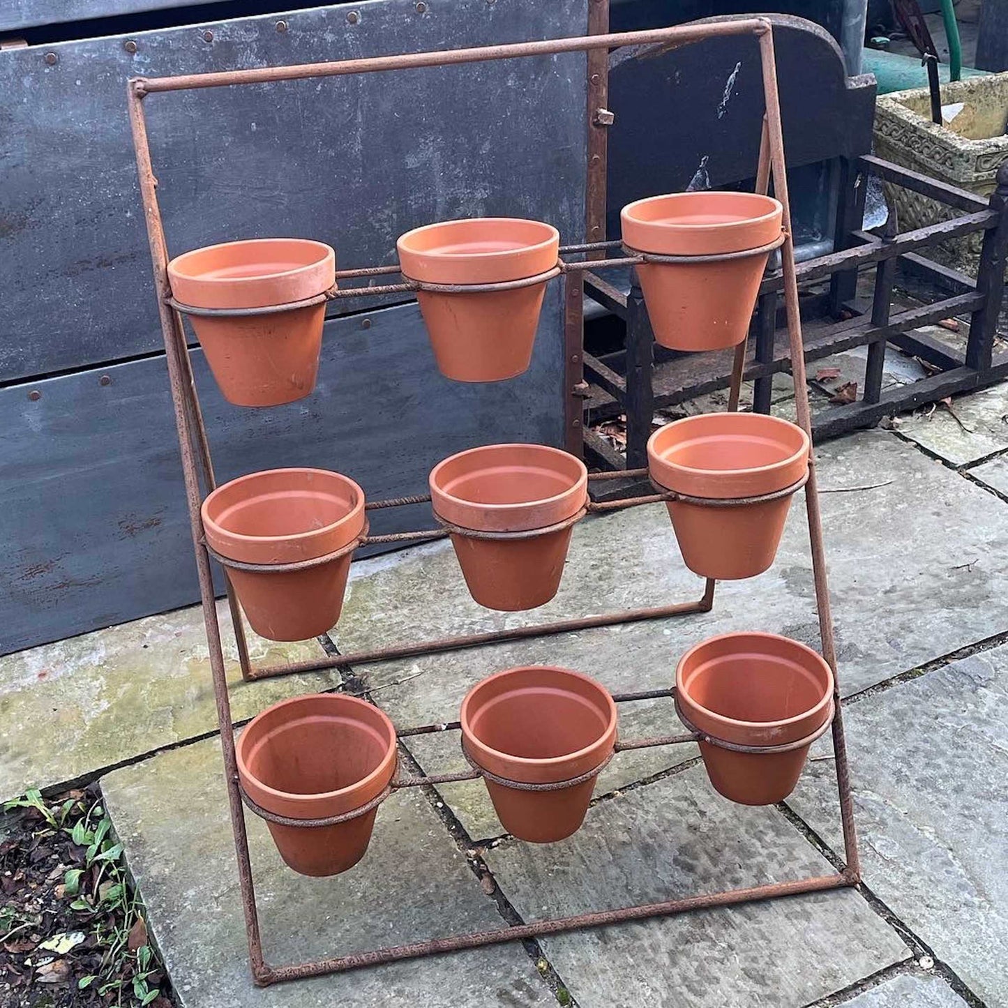 Metal tiered plant theatre pot stand 9 pot