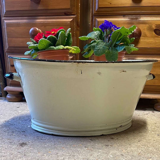 Cream enamel oval tub with two handles 45cm.