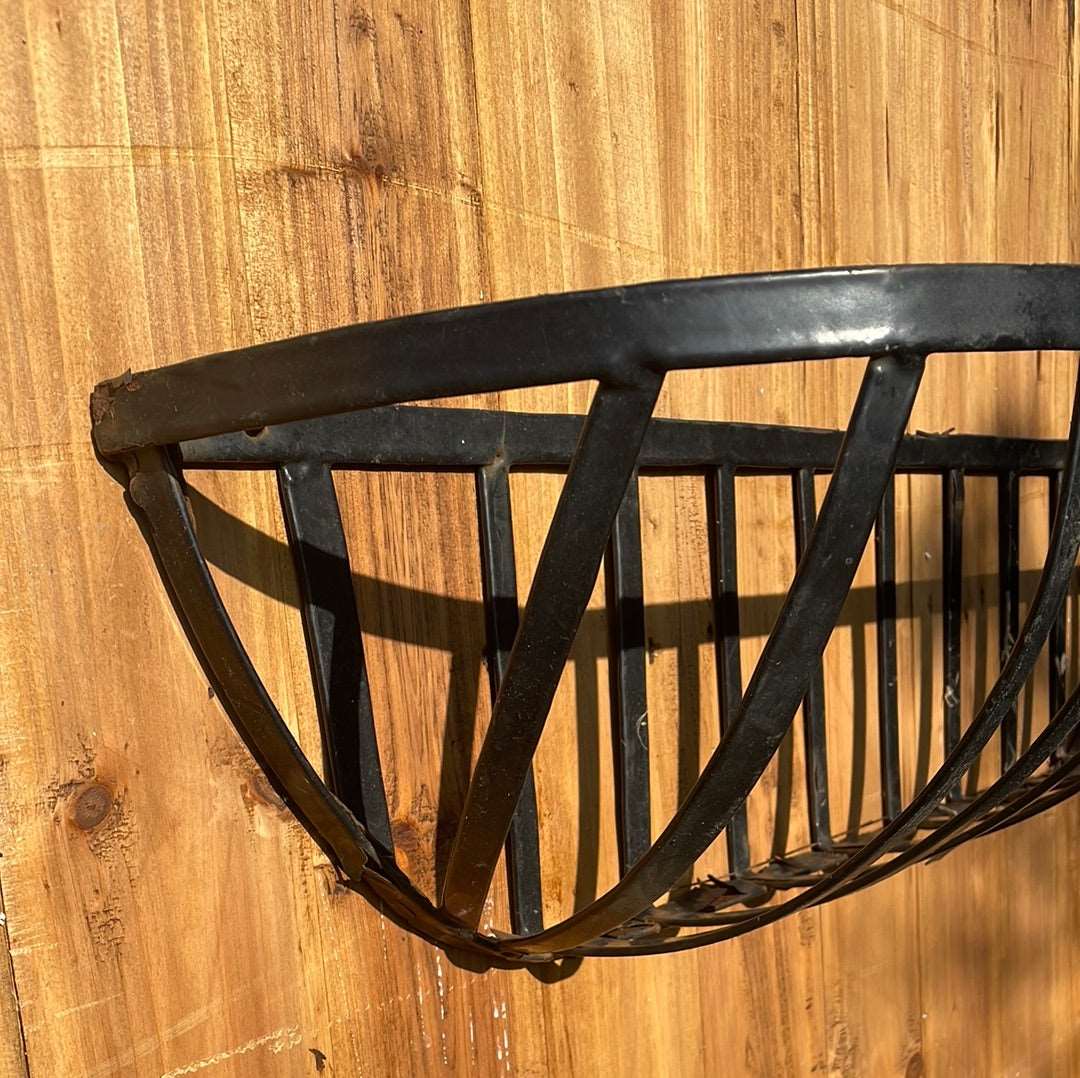 Metal wall planter basket.