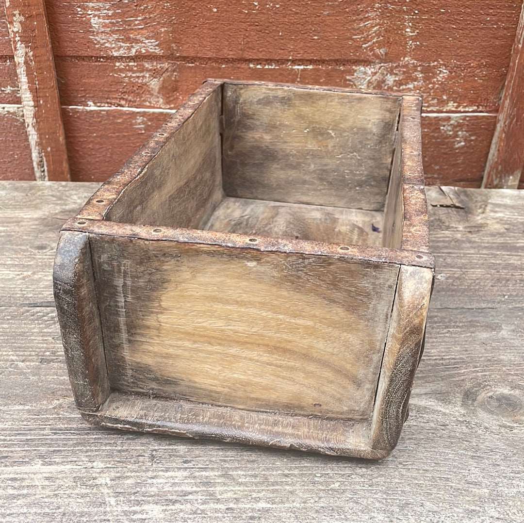 Single Indian rustic wooden brick mould view from end.