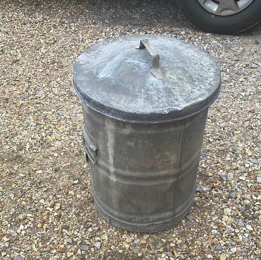 Small galvanised dustbin with lid.
