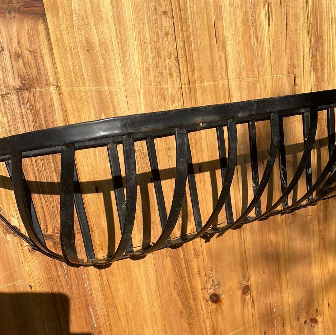 Metal wall planter basket.