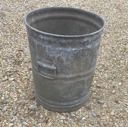 Small galvanised dustbin with lid.