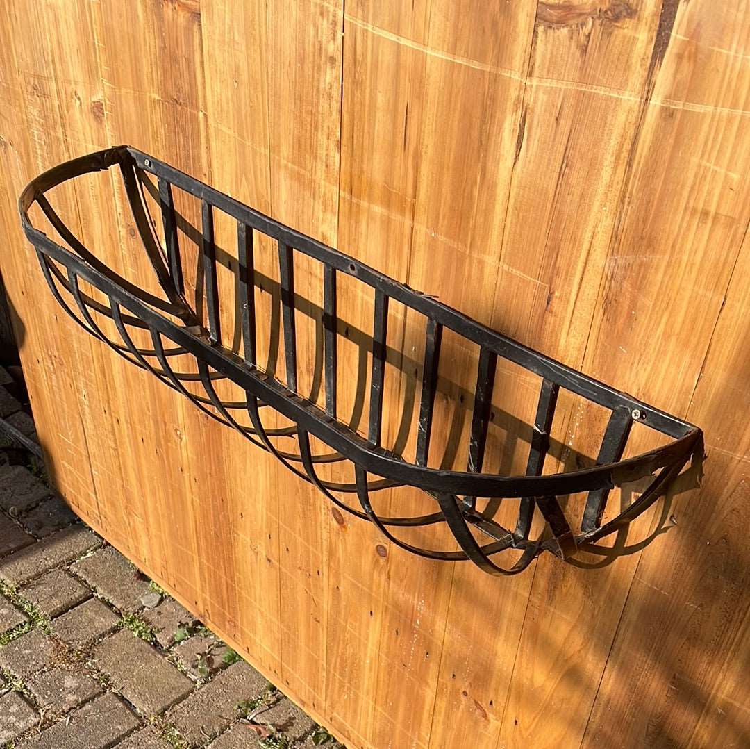 Metal wall planter basket.