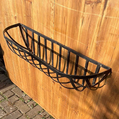 Metal wall planter basket.