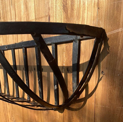 Metal wall planter basket.