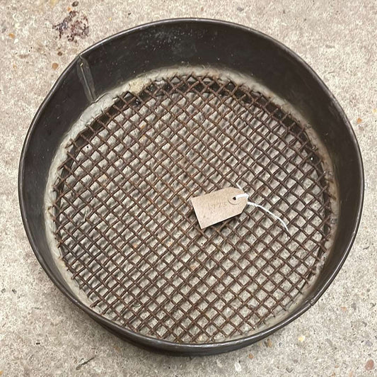 Heavy sided vintage metal garden sieve.