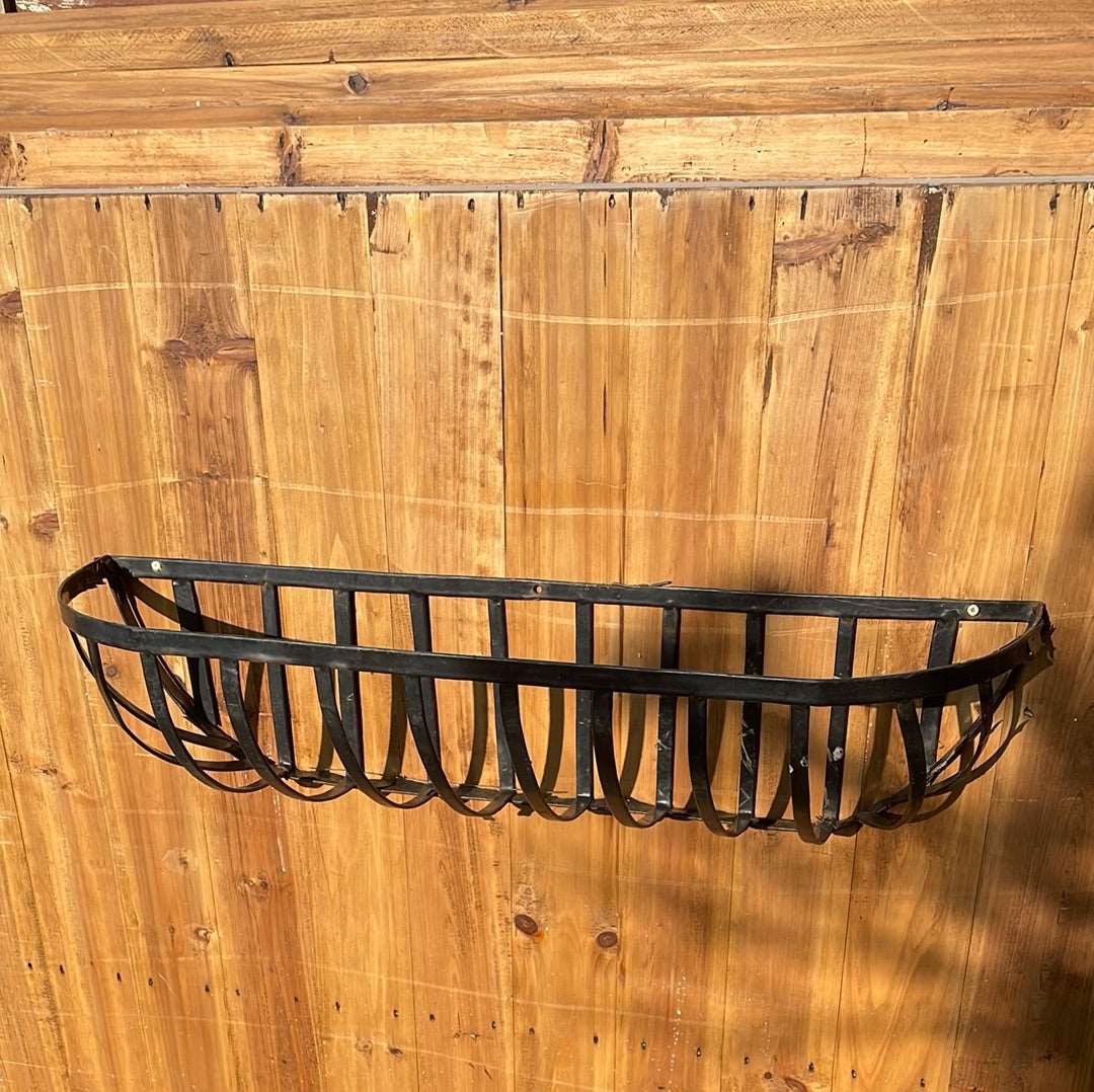 Metal wall planter basket.