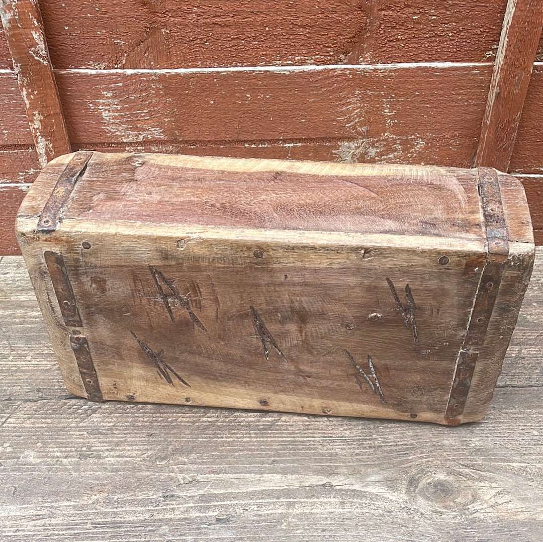 Single Indian rustic wooden brick mould plant container wooden box, bottom view.