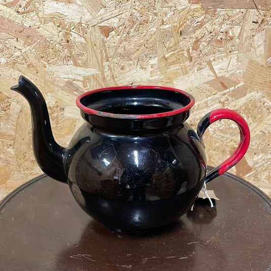 Black enamel tea pot without lid.