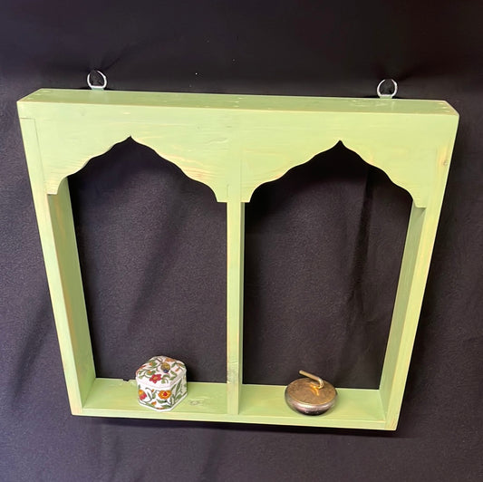 Wooden Indian temple style double sided shelf, light green.