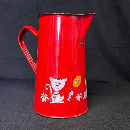 Red enamel 2 litre jug with cartoon characters.