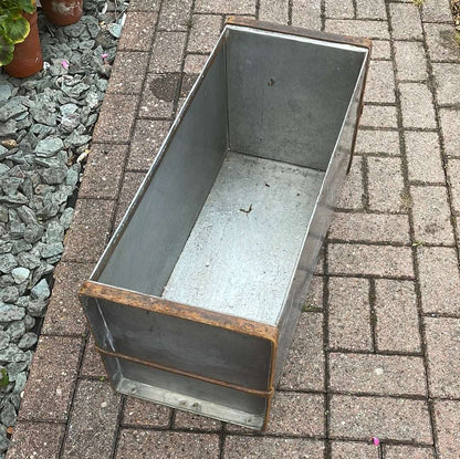 Rectangular metal trough planter top view.