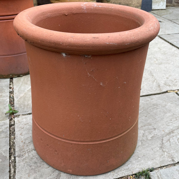 Small terracotta chimney pot.
