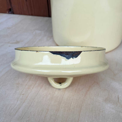 Cream enamelled churn container with lid.